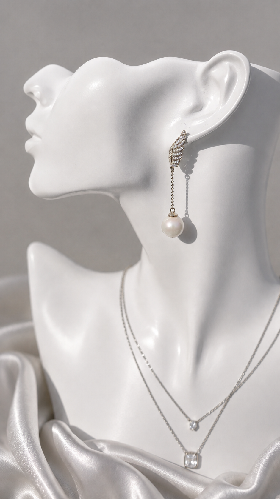 Winged Pearl Drop Earrings