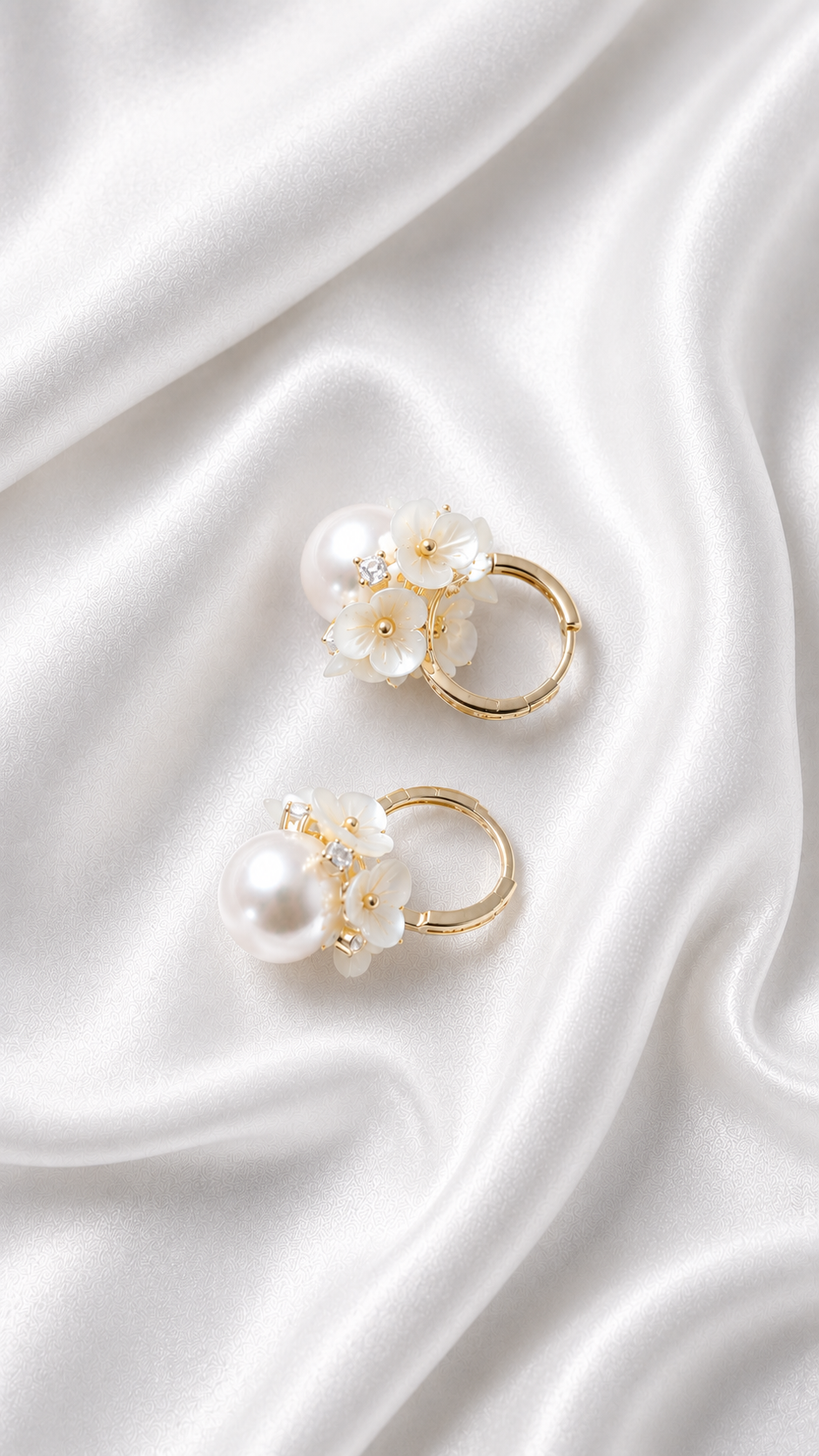 Aria Blossom & Pearl Hoops pair on soft linen