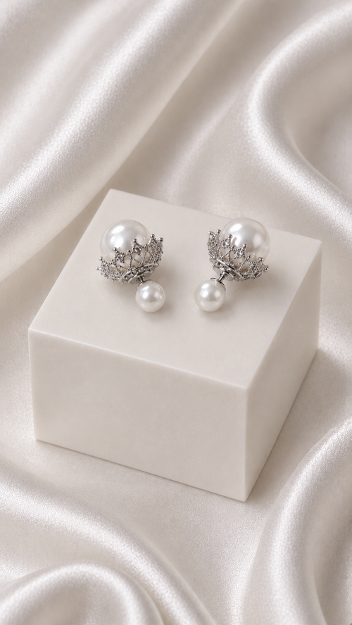 Aria Crown Pearl Studs pair on neutral linen