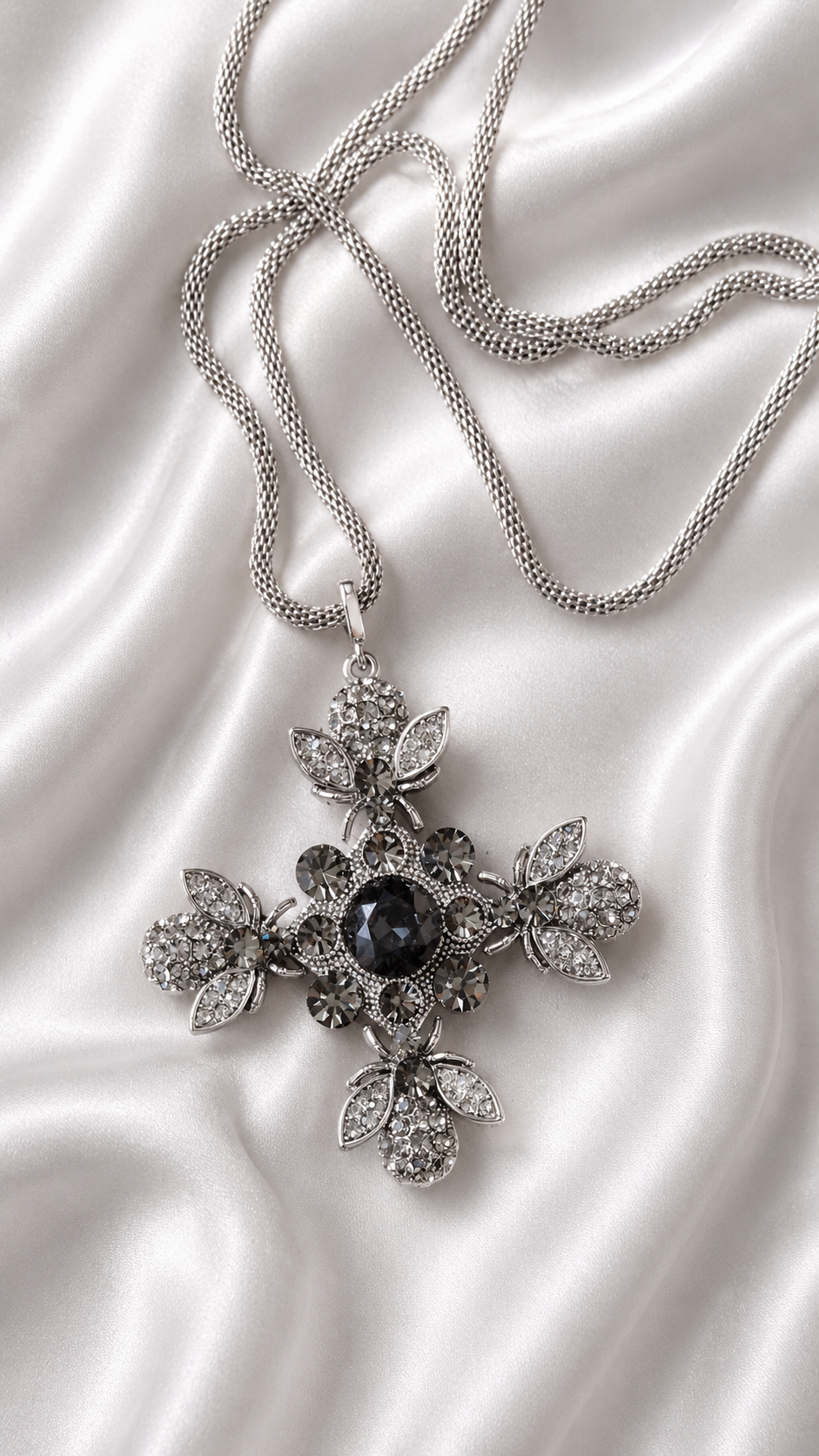 Close-up of botanical pendant on Aria Midnight Botanical Necklace