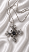Close-up of botanical pendant on Aria Midnight Botanical Necklace