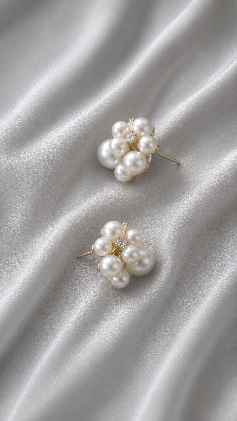 Aria Pearl Bloom Studs styled on soft silk fabric